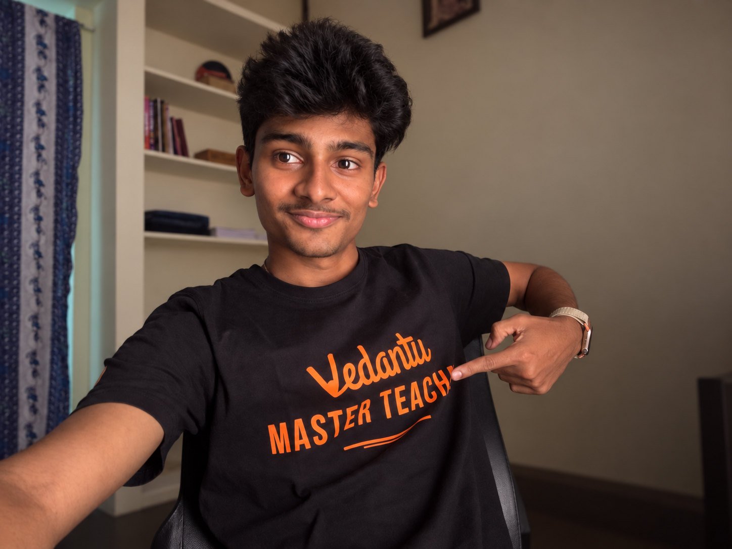Chandan Mettu smiling in a Vedantu Master Teacher T-shirt